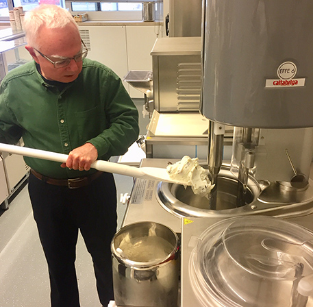 Man Scooping Gelato At The Store